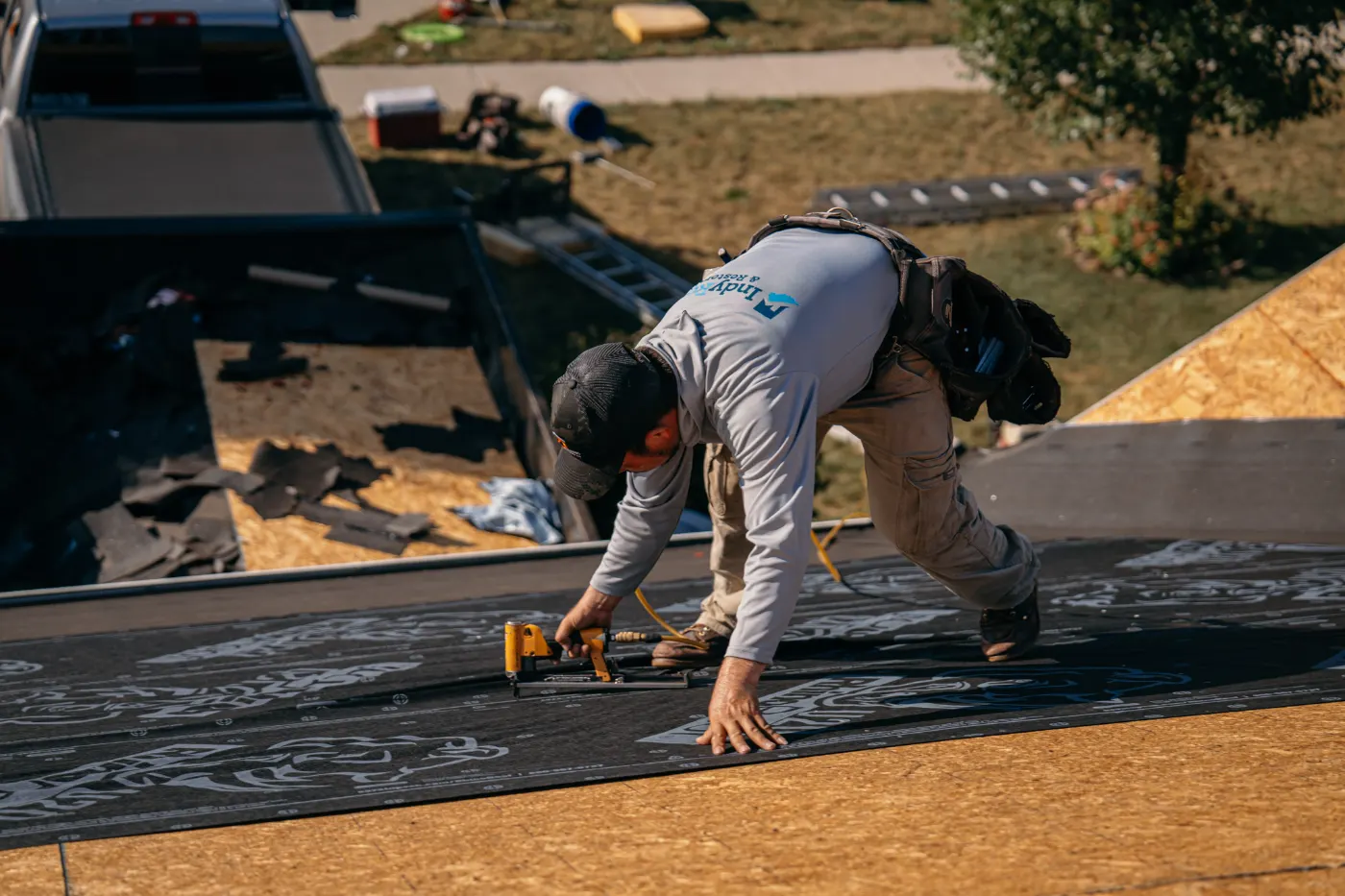 Emergency tarping on a Wilkinson roof